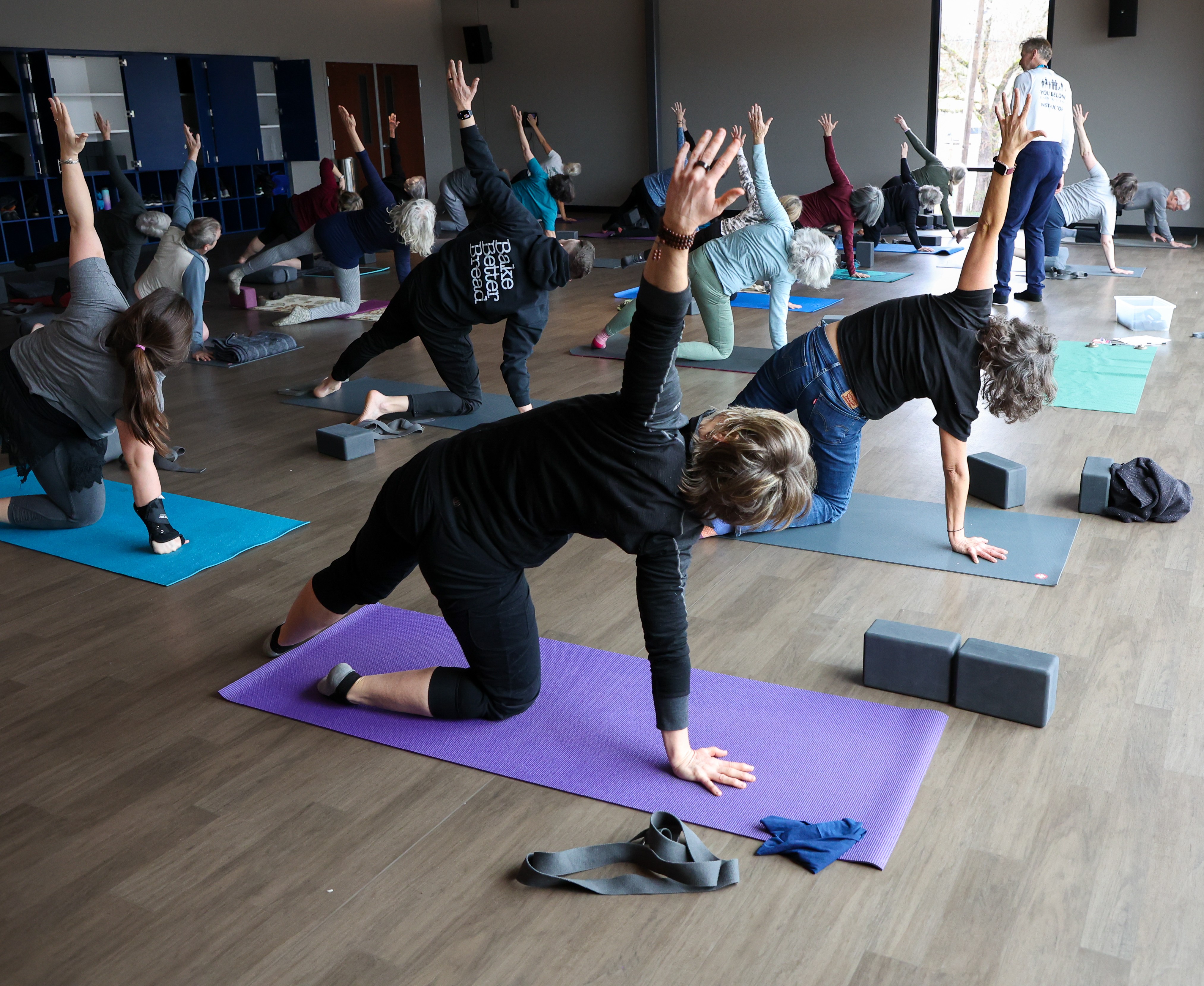 Y member practicing yoga