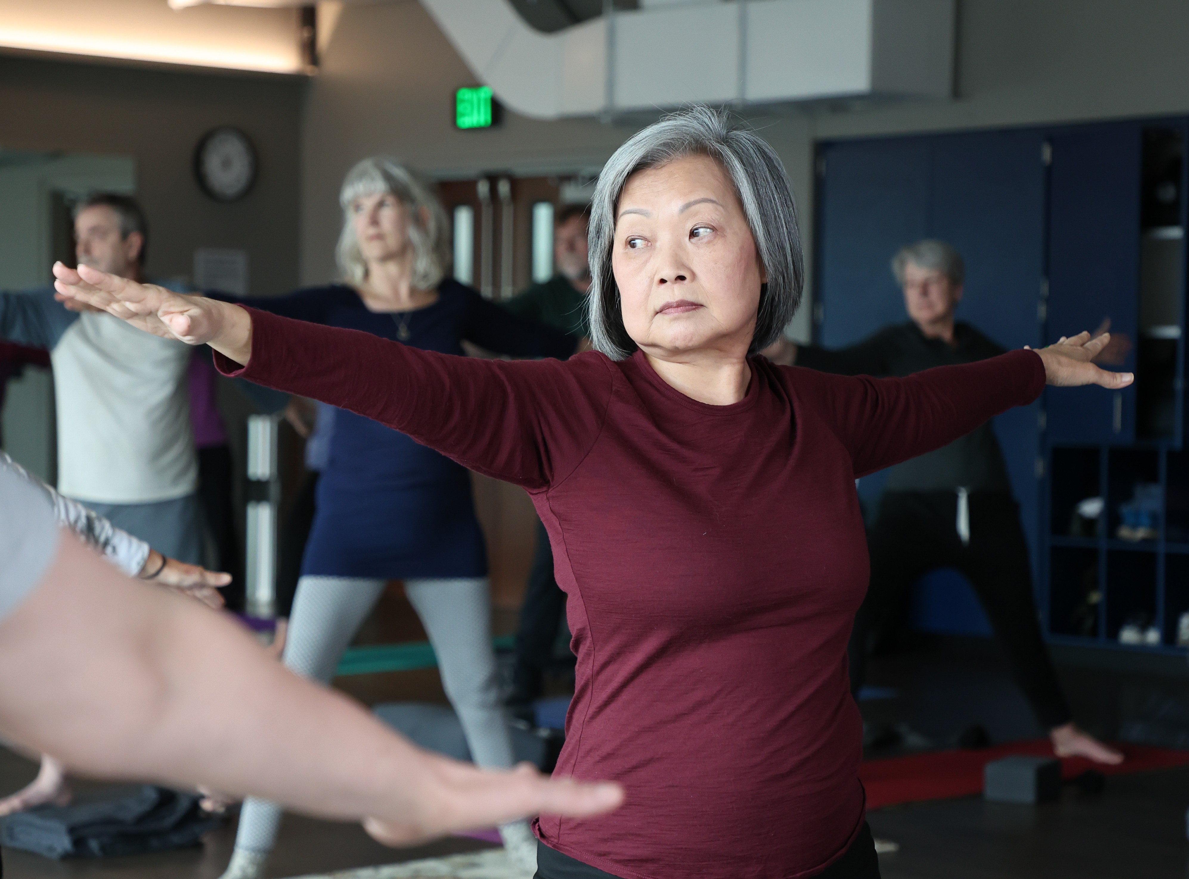 people doing arm extension yoga poses