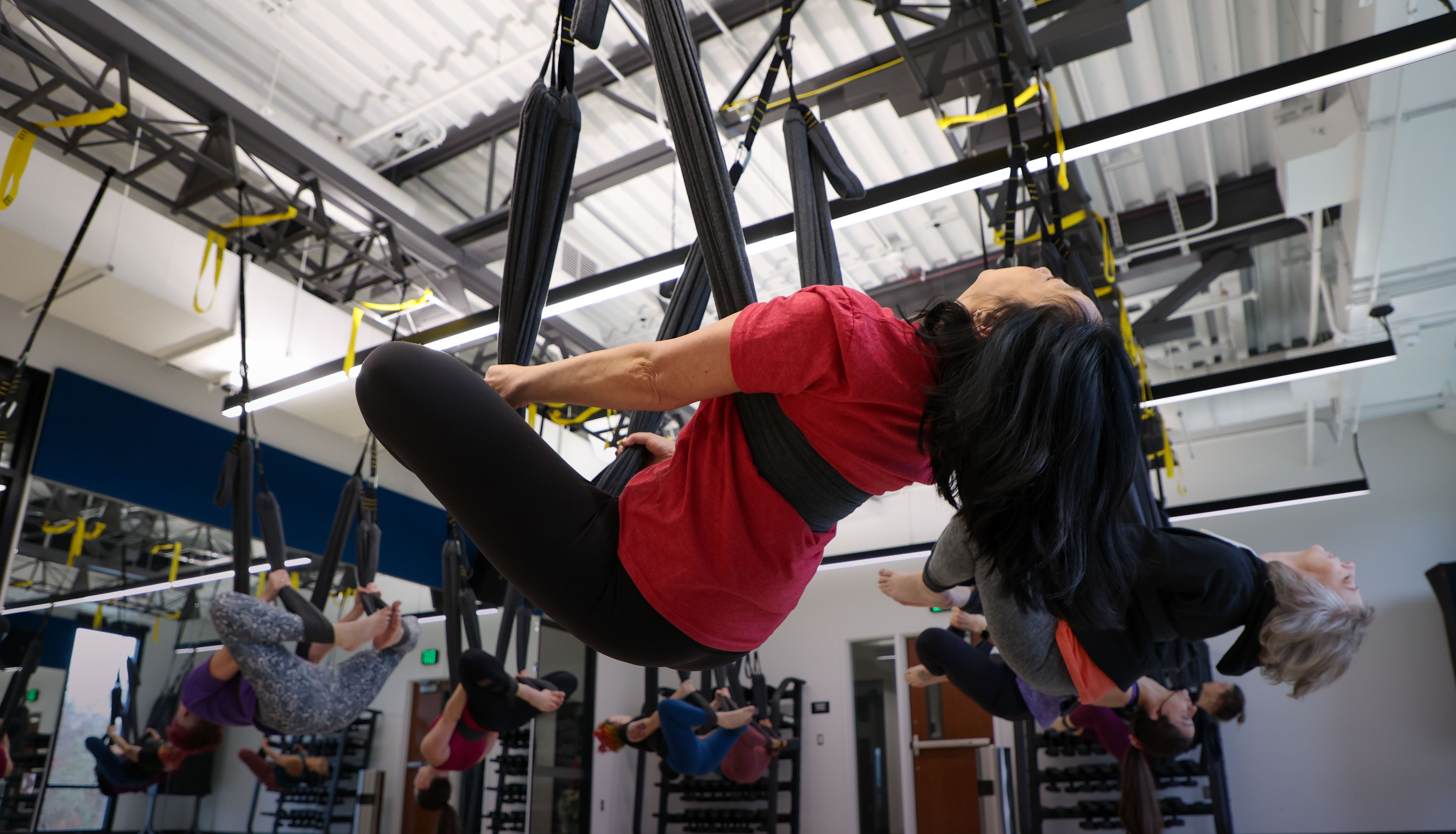 https://www.eugeneymca.org/sites/default/files/revslider/image/aerial-yoga-bottom-shading_0.jpg