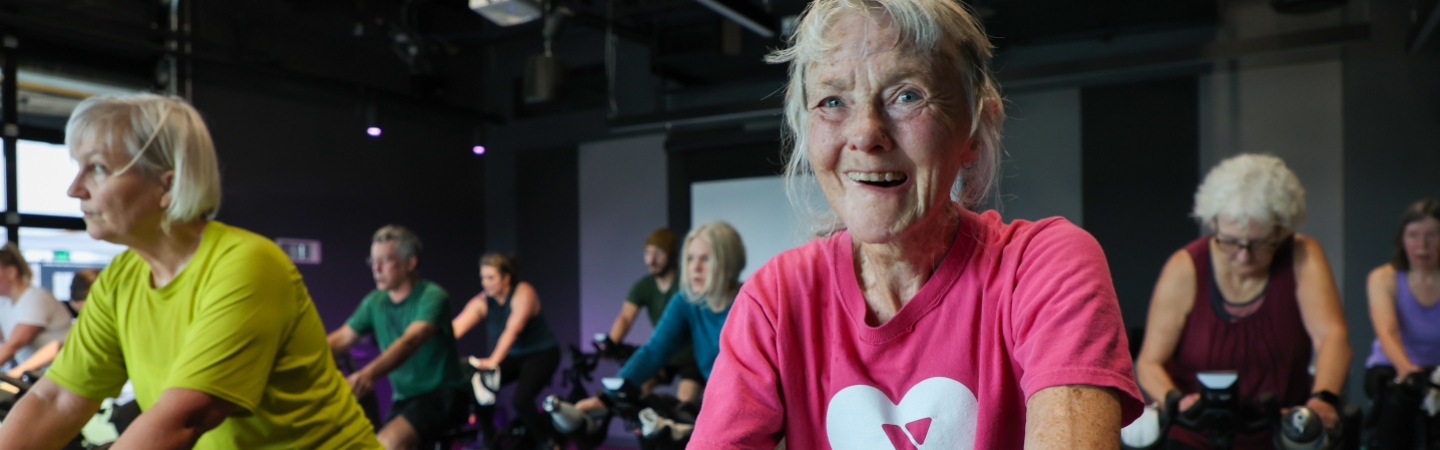 woman takes cycle class at eugene ymca