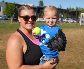 mom and young son play t-ball at eugene ymca